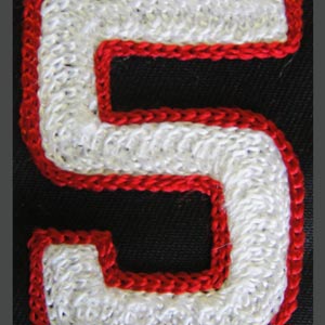 A Chain Stitch Number Five Crest